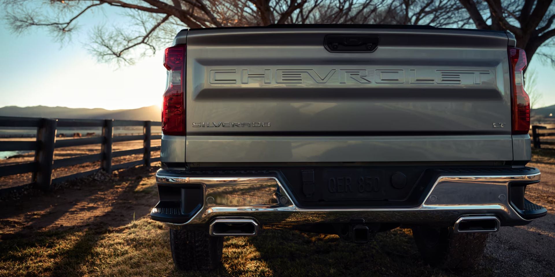 The rear end of a silverado 1500.